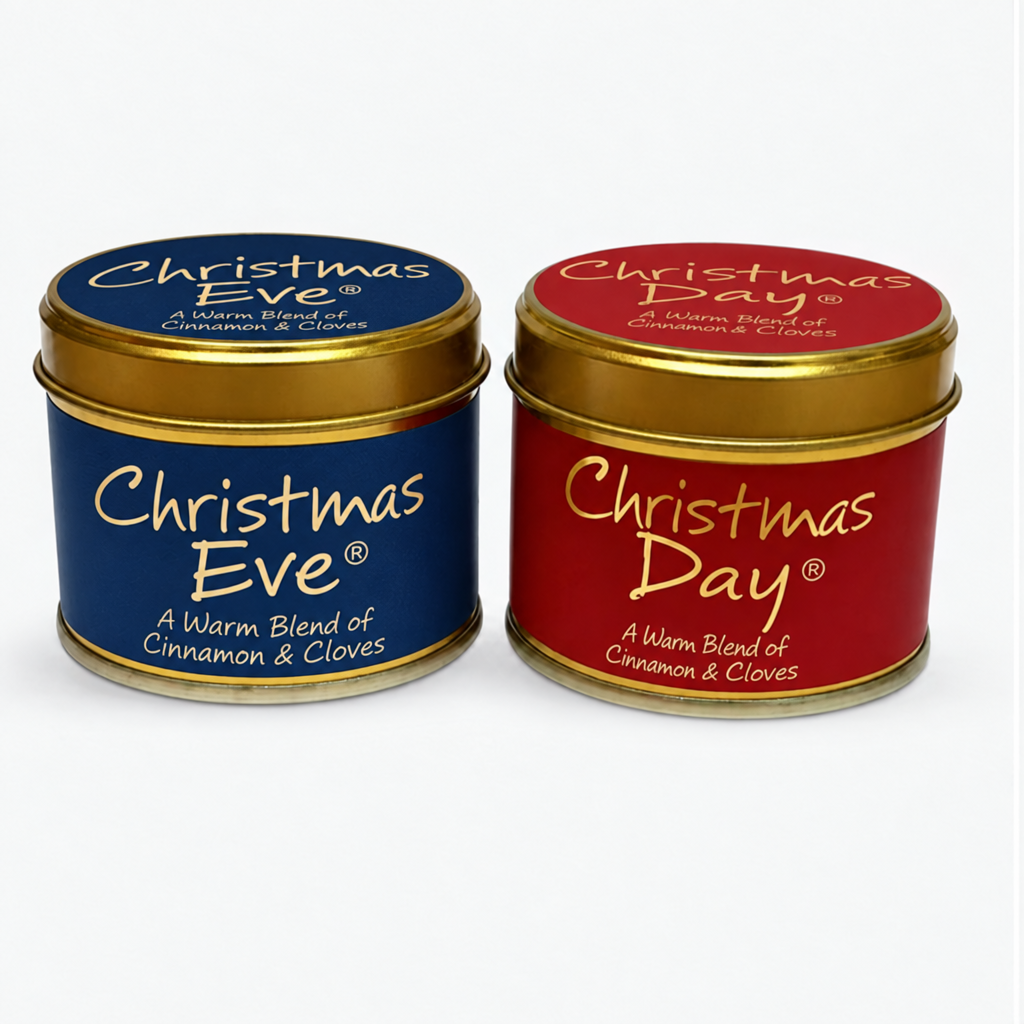 Blue Christmas Eve candle beside the red Christmas Day candle